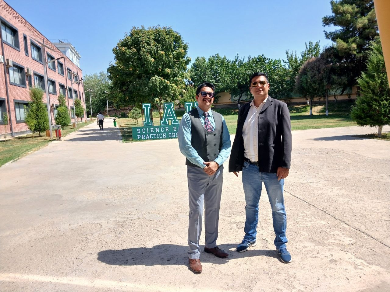 On the campus of the agricultural institute hosting the conference programme in Uzbekistan.