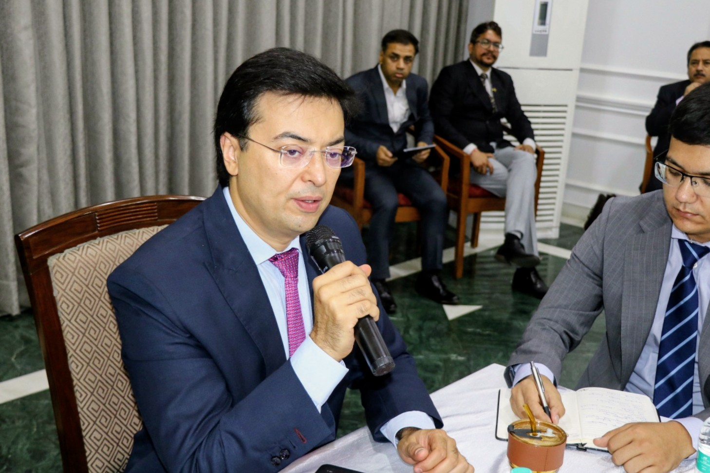 Uzbekistan Tech and Trade movement — Yogesh Kumar speaking during an India round-table conference.