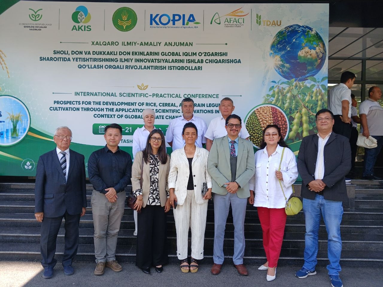 Conference participants at the international scientific-practical conference on rice, cereal and grain legume cultivation.